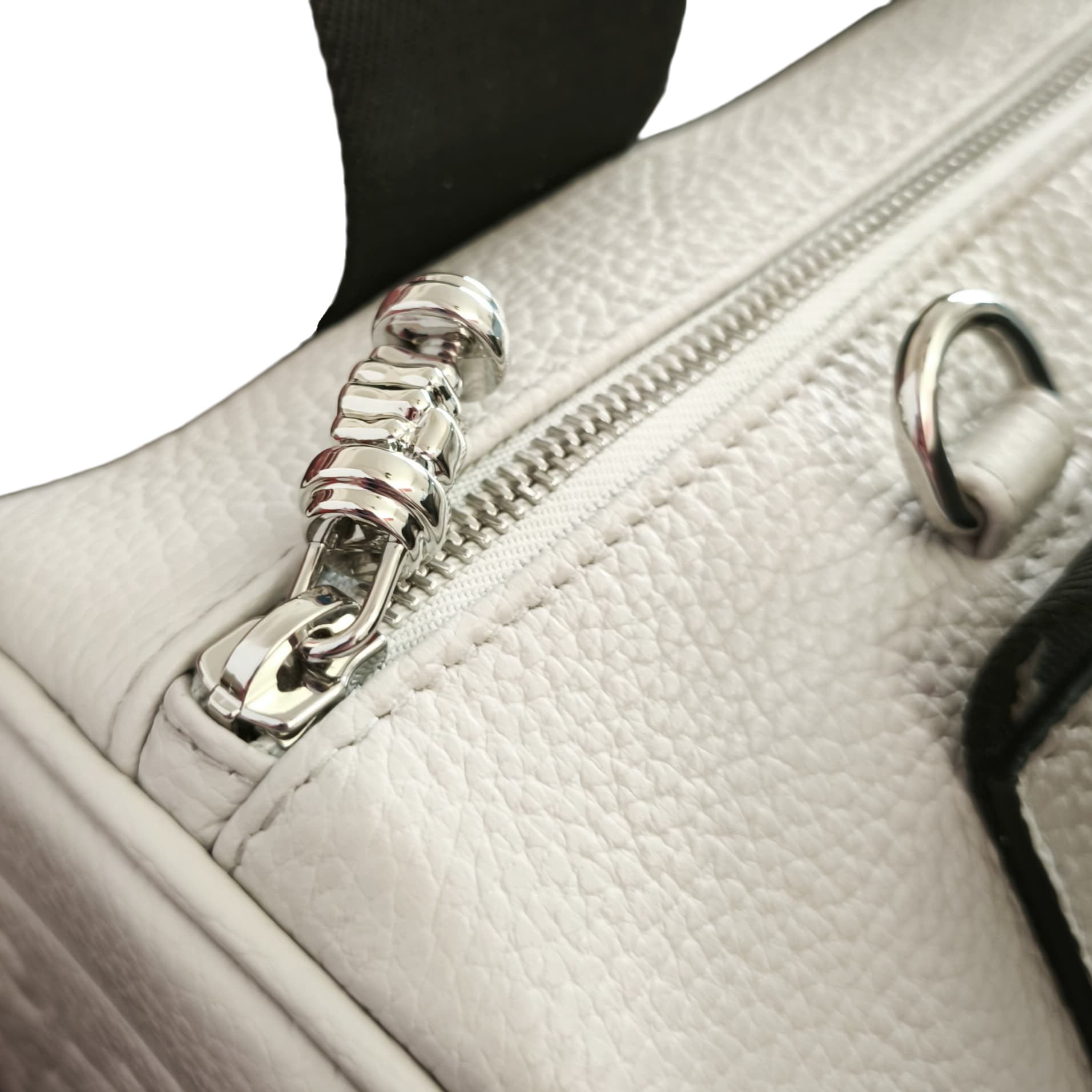 Tira zip rappresentante un pugno che serra nel palmo un manubrio da palestra in finitura argento lucido presente su modelli NORA small